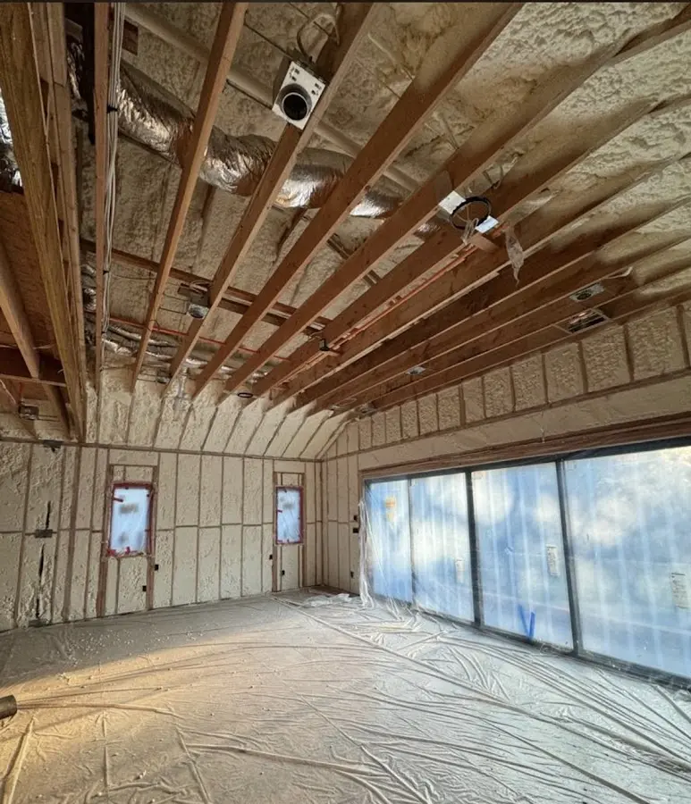 Interior walls and ceiling insulated with spray foam during new construction in St. Martinville